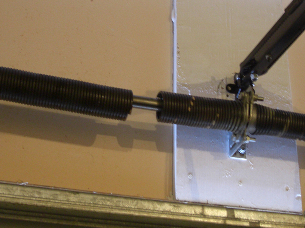 Broken Garage Door Springs Repair  Anco Ovehead Door